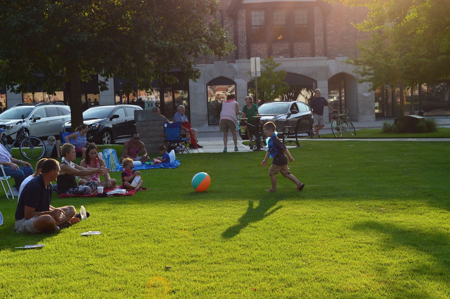 Community members sit on blankets and chairs at Cortesi Veterans Memorial Park to watch Mr. Meyers band perform Aug. 4, 2016.
